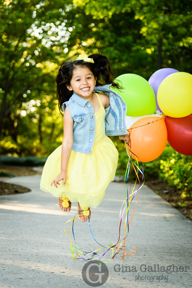 jumping, balloons, yellow dress, Gina Gallagher Photography, The Woodlands Family Photographer