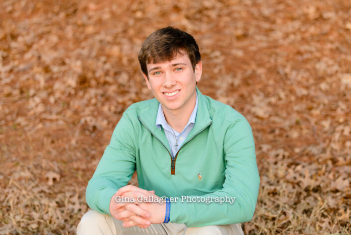 Portrait of a guy wearing a green sweater