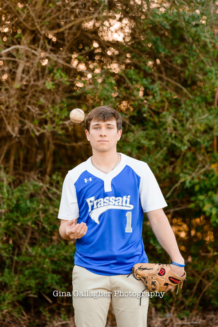 Senior Guy tossing a baseball