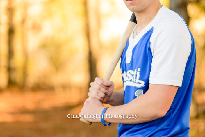 Close Up of a Senior Guy with a Baseball Bat