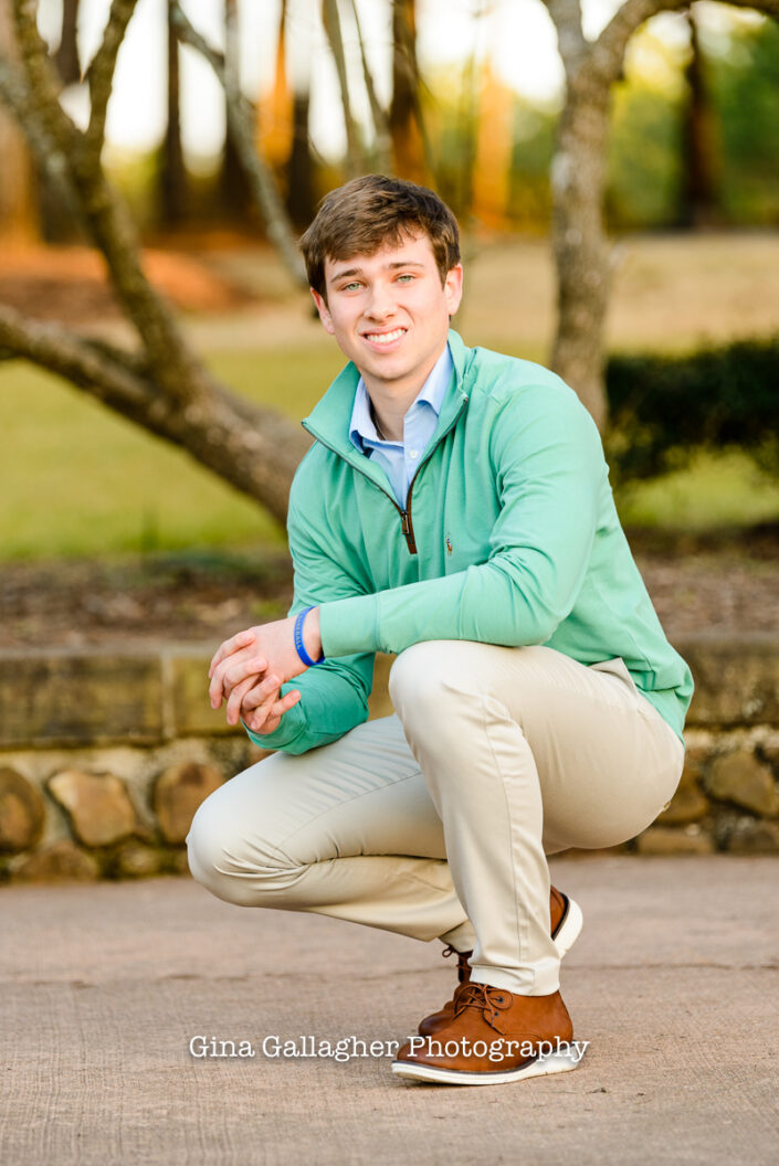 Portrait of a guy wearing a green sweater