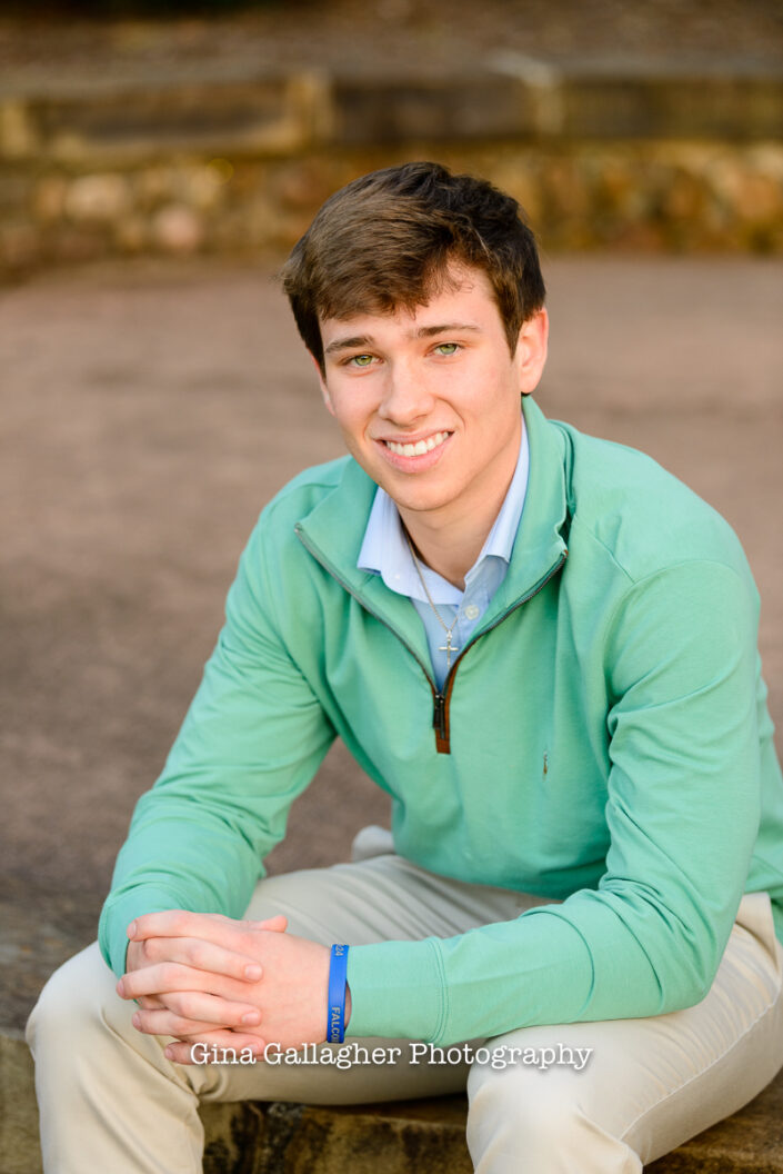 Portrait of a guy wearing a green sweater