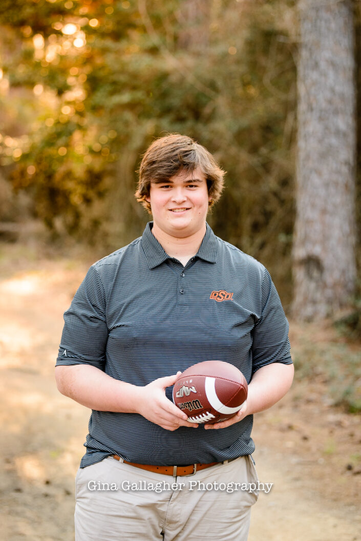 Senior Guy Holding a Football