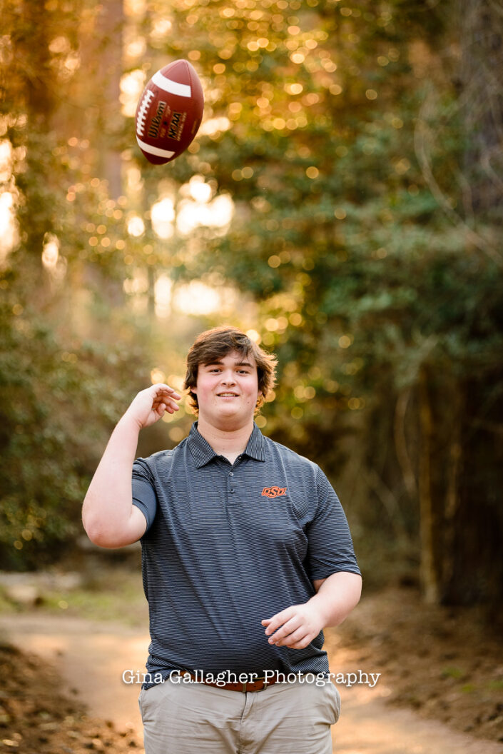 Senior Guy tossing a football